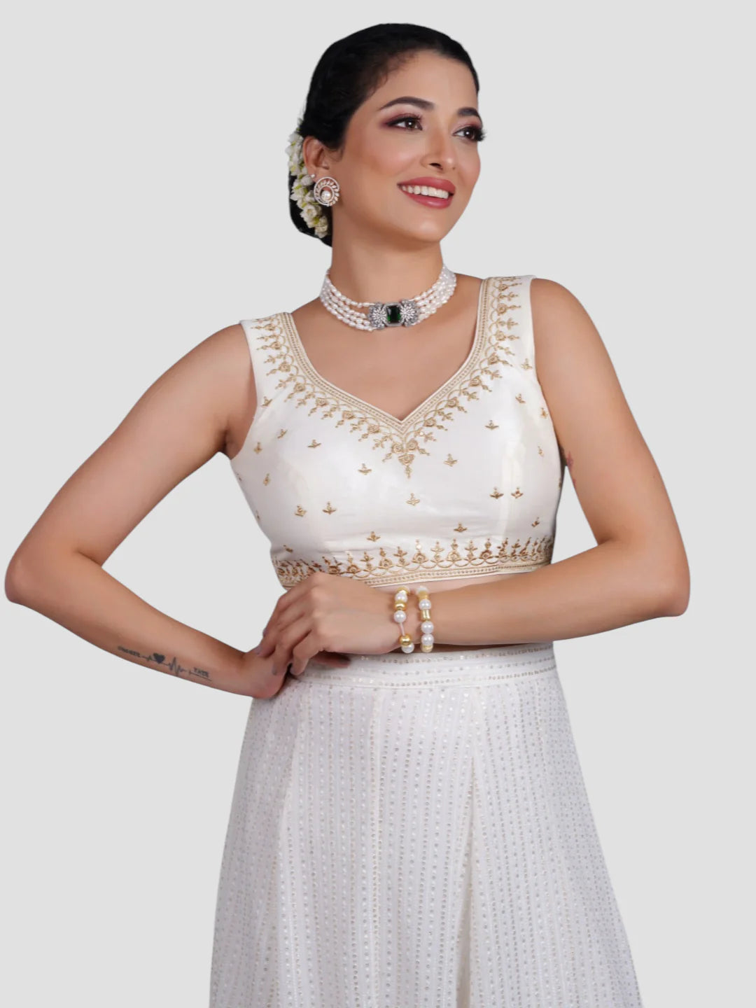 White Embroidered Sleeveless Readymade Saree Blouse
