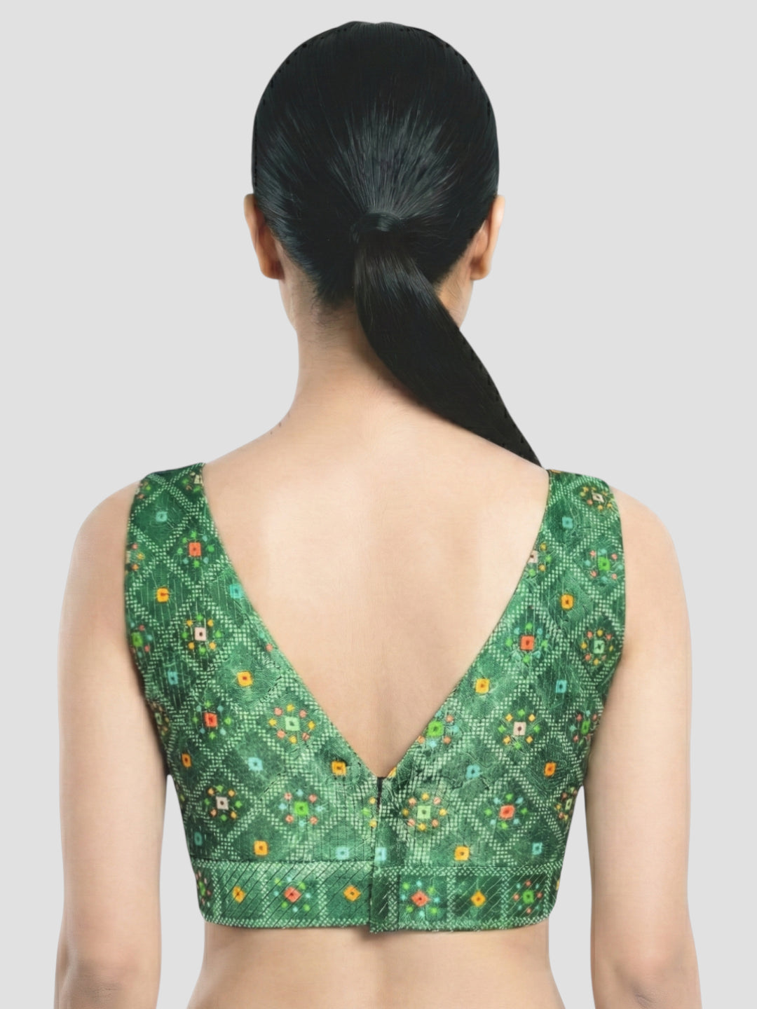 Green Printed Sleeveless V-Neck Ethnic Blouse with Deep Back Design