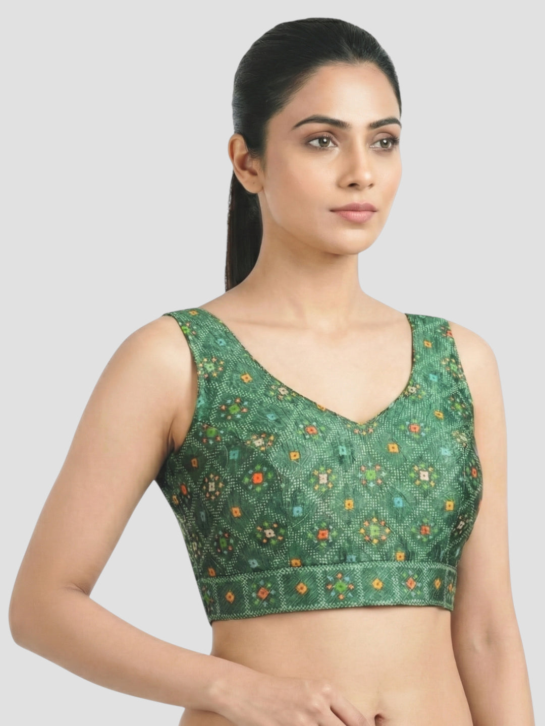 Green Printed Sleeveless V-Neck Ethnic Blouse with Deep Back Design
