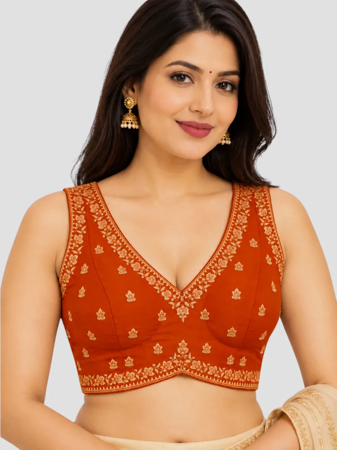 Rust Orange Dupion Silk Embroidered Sleeveless Ready-Made Saree Blouse with Deep V-Neck and Back Dori Tie-Up