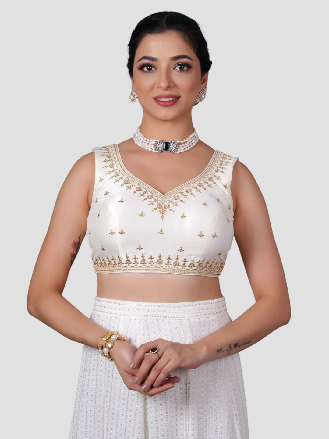 White Embroidered Sleeveless Readymade Saree Blouse