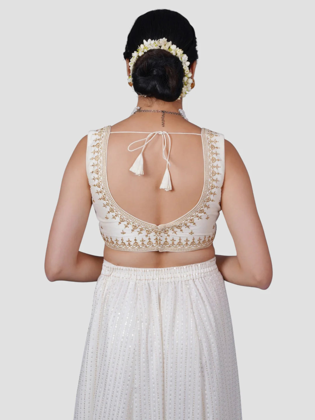 White Embroidered Sleeveless Readymade Saree Blouse