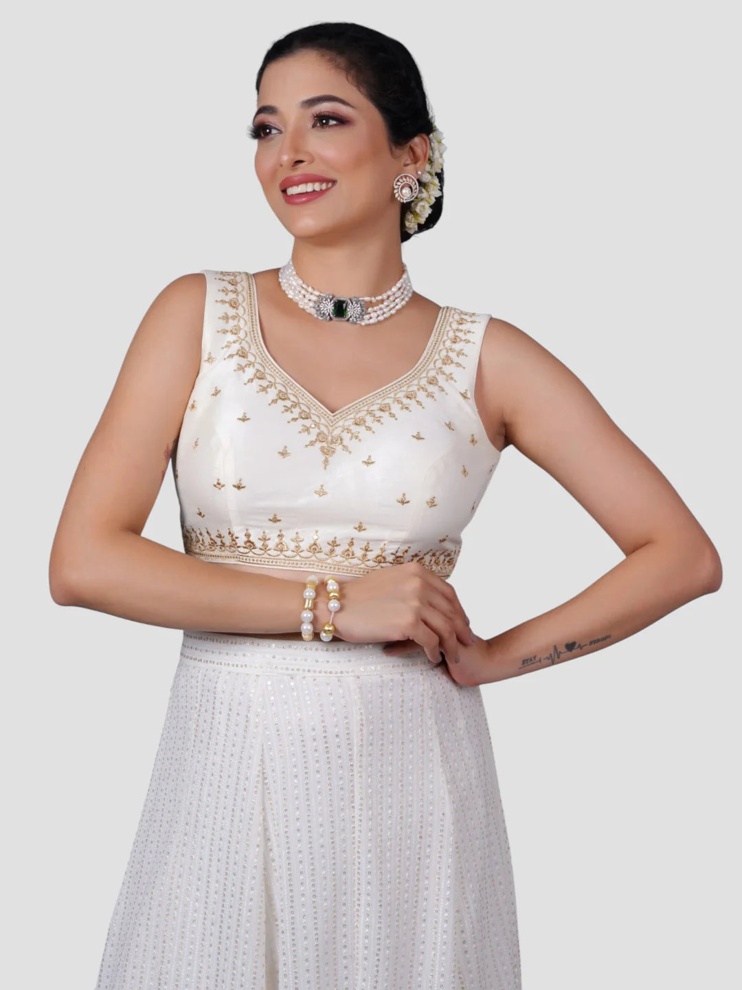 White Embroidered Sleeveless Readymade Saree Blouse