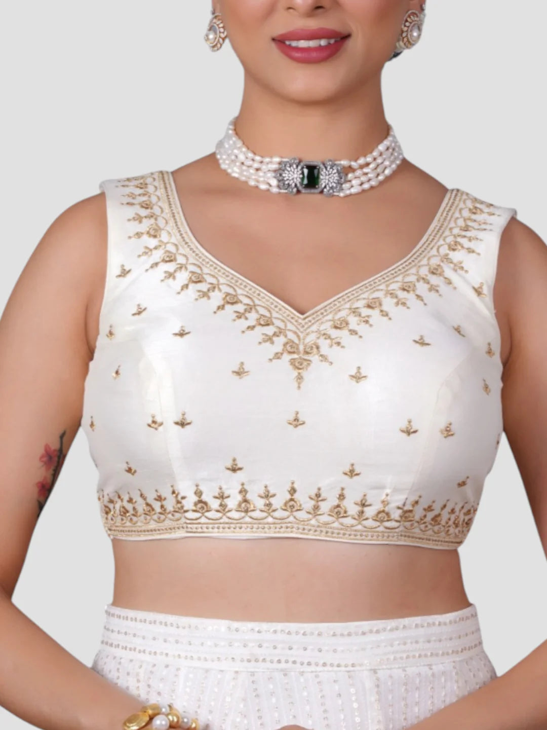 White Embroidered Sleeveless Readymade Saree Blouse