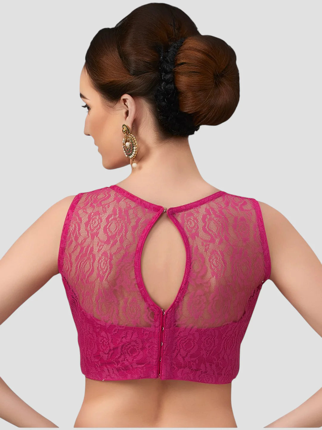 Rani Pink Radiance Sleeveless Floral Net Saree Blouse With Round Neckline