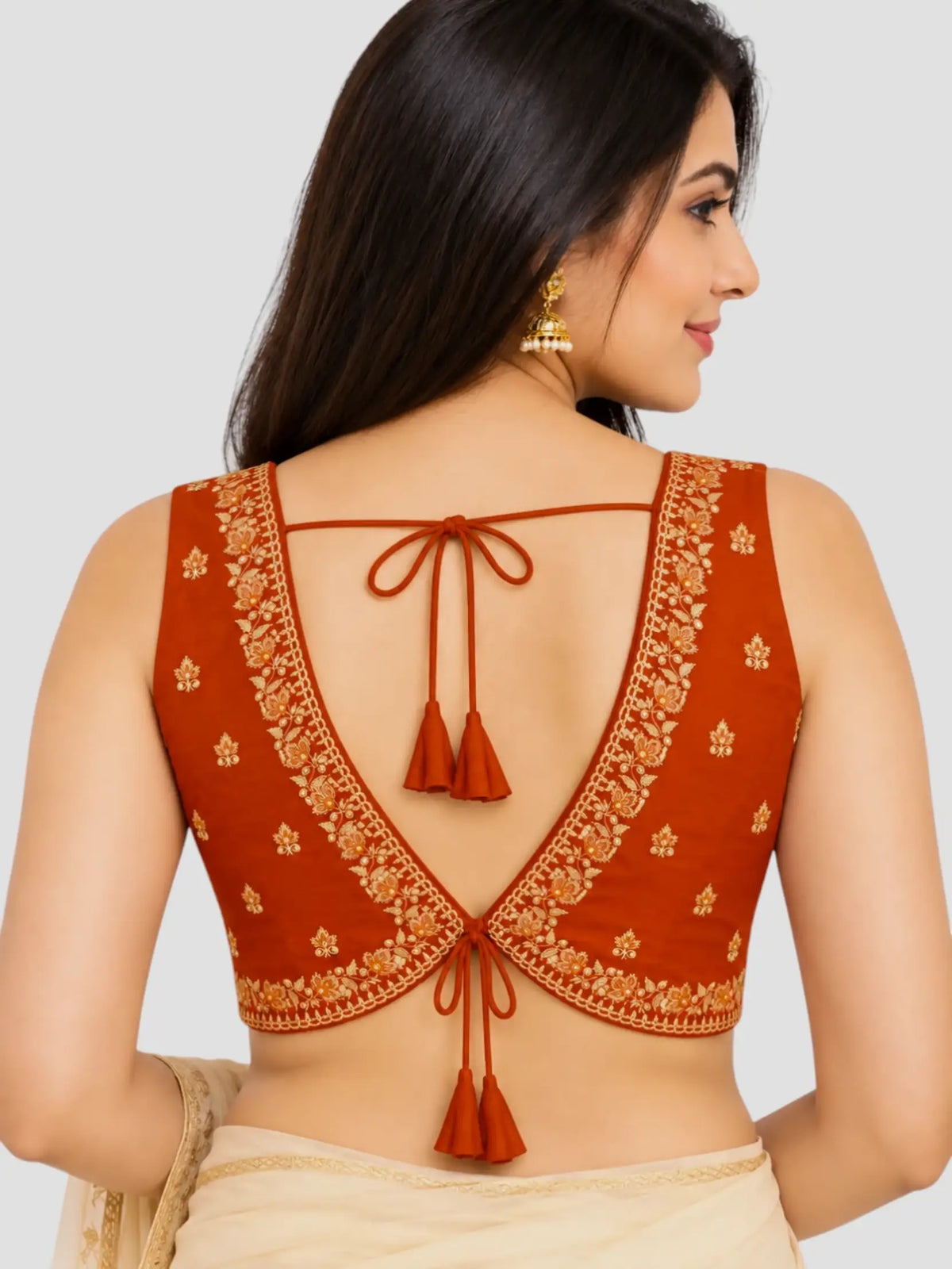 Rust Orange Dupion Silk Embroidered Sleeveless Ready-Made Saree Blouse with Deep V-Neck and Back Dori Tie-Up